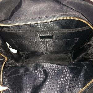 Black Kate Spade backpack only used once.